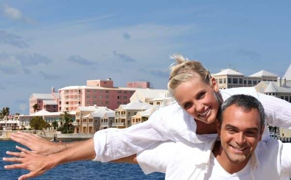 flying couple in front of Hamilton in Bermuda